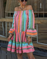 Båtringad klänning med klockärmar